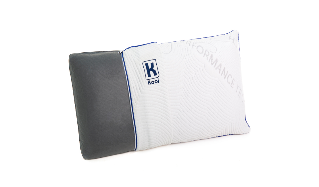 Kooi charcoal pillow with white pillow cover partially removed to reveal grey foam.
