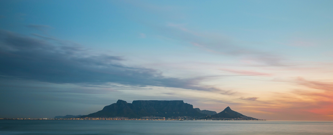 Table Mountain against a dusky sky.