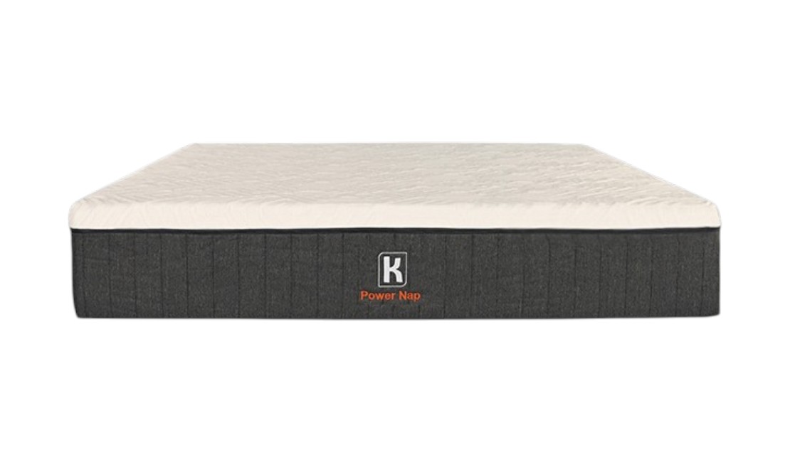 White and dark grey Kooi bedroom mattress against a white background
