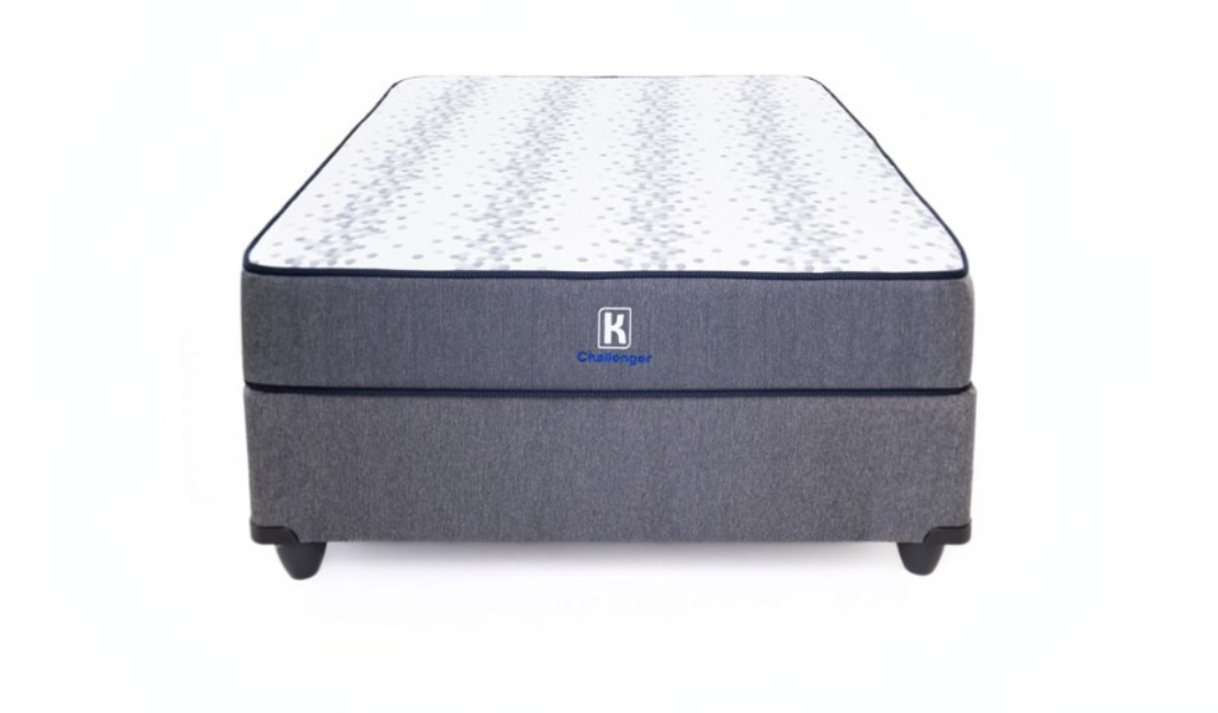 A dark grey and white Kooi Challenger bed against a white background