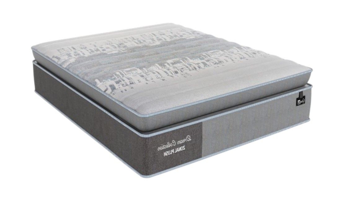 A grey plush mattress against a white background